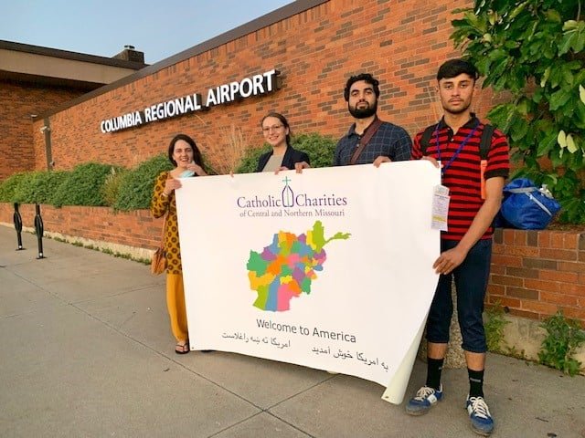 From left, Frishta Aslami, Catholic Charities Afghan Program Coordinator, Samantha Moog, Catholic Charities Director of Refugee Services, and Ismat Kaakar, Catholic Charities Afghan Program Coordinator, welcome Fazal at the Columbia airport Sept. 26.